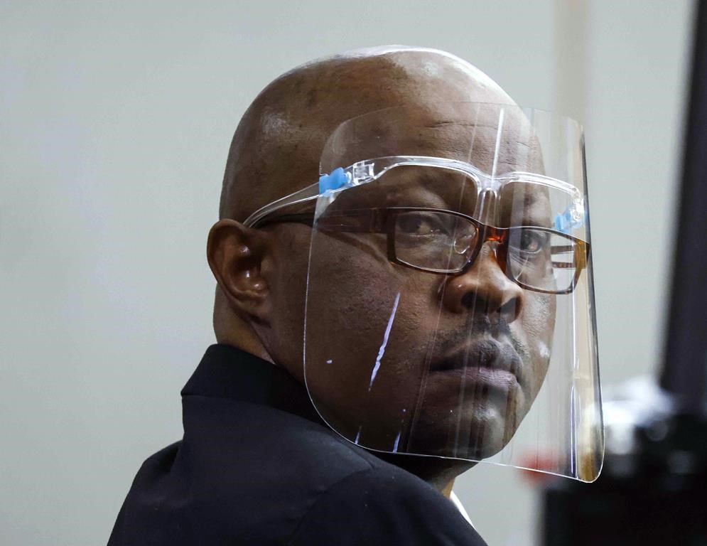 FILE - Accused serial killer Billy Chemirmir looks back ahead of his retrial on Monday, April 25, 2022, at Frank Crowley Courts Building in Dallas. Authorities confirmed he was murdered by his cellmate in prison this week.