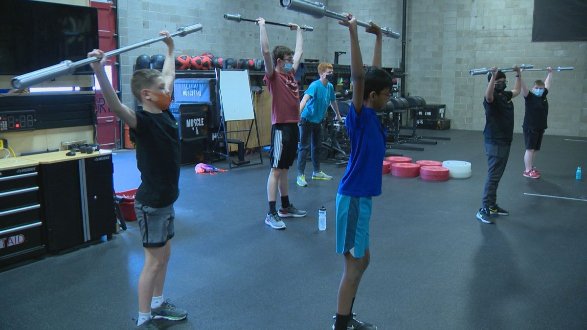 Kids with autism weightlifting