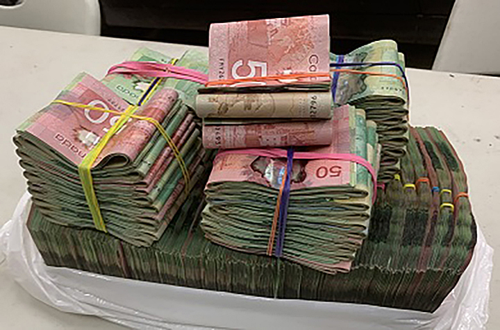 A photo of the approximately $100,000 that was seized by B.C. Highway Patrol after an officer pulled over a speeder earlier this week.