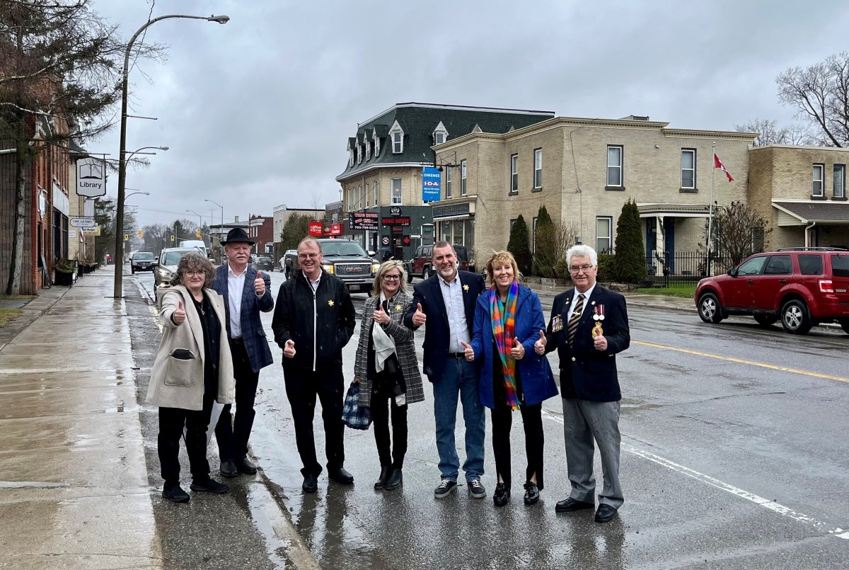 Haliburton-Kawartha Lakes-Brock Conservative MPP Laurie Scott, second from right, announced $3M for upgrades to King Street in Omemee on April 21, 2022.