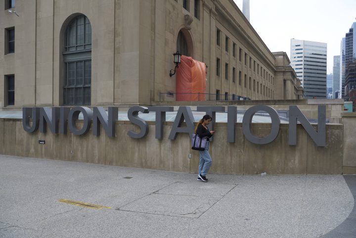 A person walks past Union Station in Toronto on Oct. 6, 2021. 