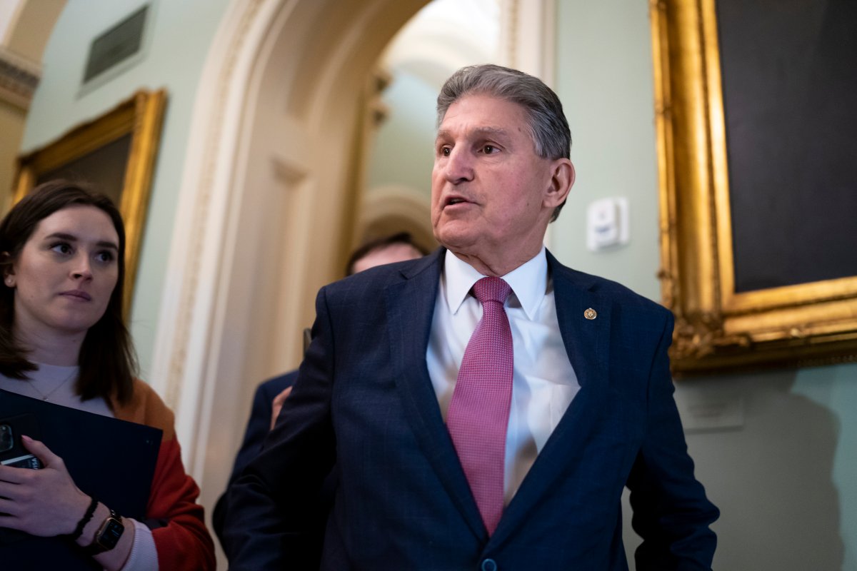Sen. Joe Manchin, D-W.Va., chairman of the Senate Energy and Natural Resources Committee, stops to speak to reporters as he arrives for a lunch meeting with fellow Democrats, at the Capitol in Washington, Tuesday, March 8, 2022.