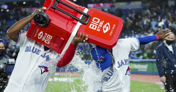 Hernandez leads Blue Jays to wild 10-8 win in Toronto’s first home opener since 2019