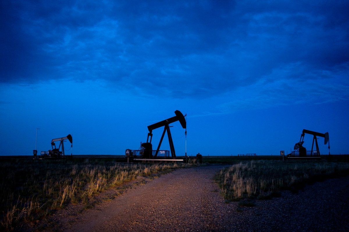 Pump jacks draw oil and gas from the ground near Calgary, Alta., Saturday, July 27, 2019.
