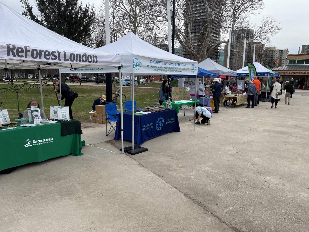 Vendors set up at Victoria Park for EarthFest.
