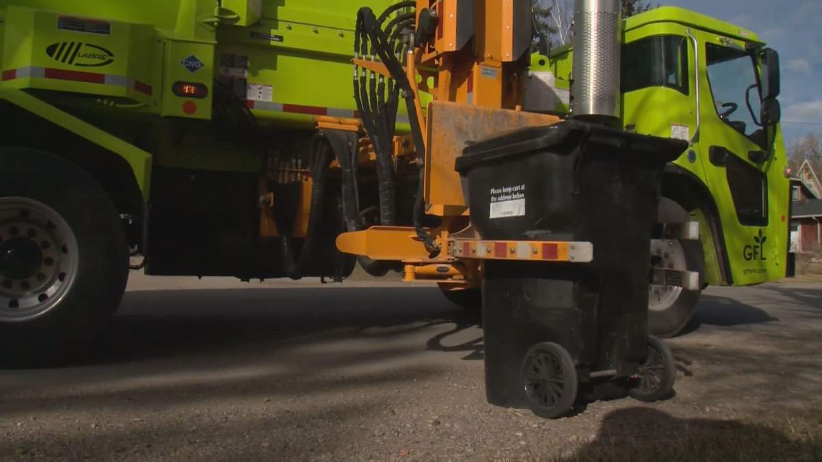A City of Calgary garbage truck picks up a black bin in this undated photo.