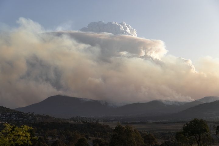 A pyrocumulonimbus cloud is generated by the intense Orroral Valley bushfire burning to the south of Canberra. The rising heat from the intense bushfires can create massive, powerful clouds that produce their own weather. January 31, 2020 in Canberra, Australia.