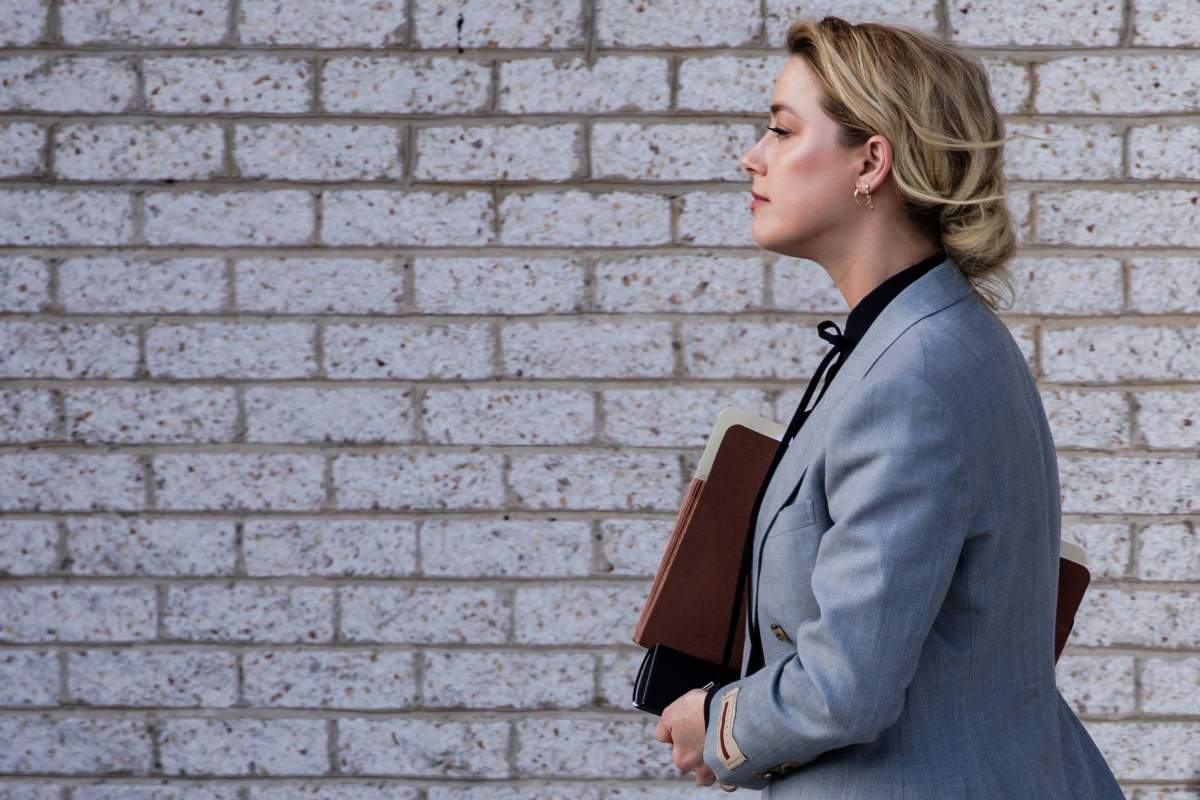 US actress Amber Heard leaves the Fairfax County Circuit Court in Fairfax, Virginia, on April 12, 2022.