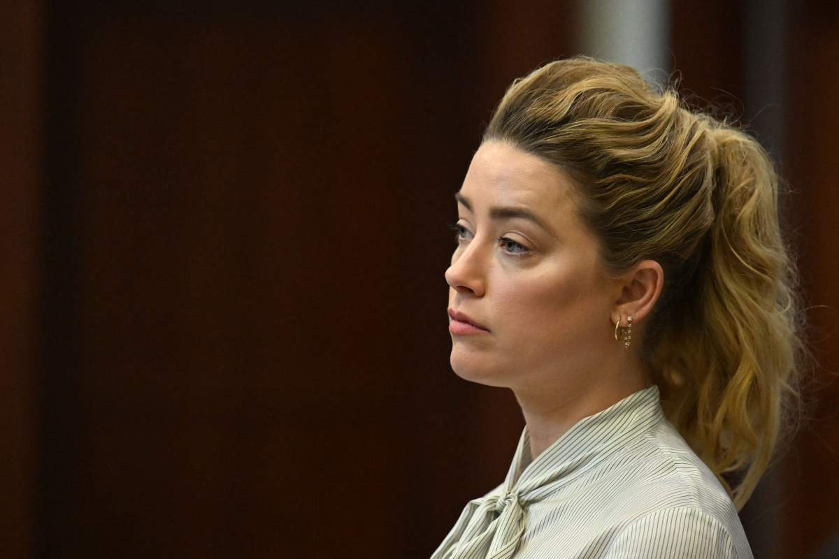 U.S. actress Amber Heard attends trial at the Fairfax County Circuit Courthouse in Fairfax, Virginia, on April 19, 2022. Johnny Depp is suing ex-wife Heard for libel after she wrote an op-ed piece in The Washington Post in 2018 referring to herself as a public figure representing domestic abuse.