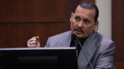 Actor Johnny Depp testifies during his defamation trial against his ex-wife Amber Heard at the Fairfax County Circuit Courthouse in Fairfax, Virginia, April 20, 2022.