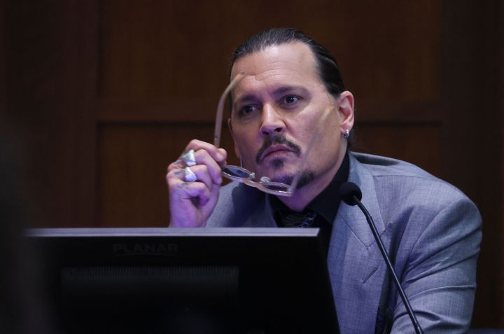 Actor Johnny Depp testifies during his defamation trial against his ex-wife Amber Heard, at the Fairfax County Circuit Courthouse in Fairfax, Va, April 20, 2022.