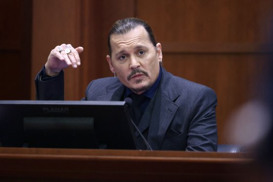 Actor Johnny Depp testifies during his defamation trial against his ex-wife Amber Heard, at the Fairfax County Circuit Courthouse in Fairfax, Virginia, April 21, 2022.