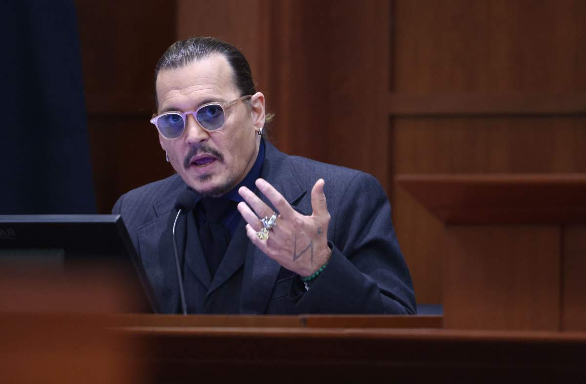 Actor Johnny Depp testifies during his defamation trial against his ex-wife Amber Heard, at the Fairfax County Circuit Courthouse in Fairfax, Virginia, April 21, 2022.