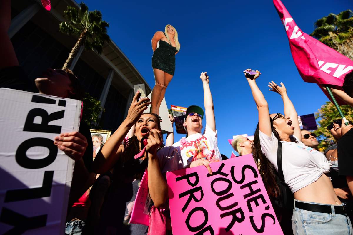 Protesters celebrate at the #FreeBritney Termination Rally at the Stanley Mosk Courthouse on November 12, 2021 in Los Angeles, California.