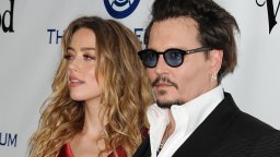 Actress Amber Heard and actor Johnny Depp attend Art of Elysium's 9th annual Heaven Gala at 3LABS on January 9, 2016 in Culver City, California.