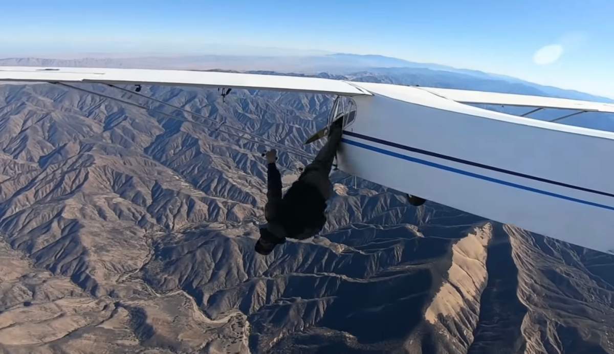 Trevor Jacob abandons and crashes his plane by diving out the side door with a parachute