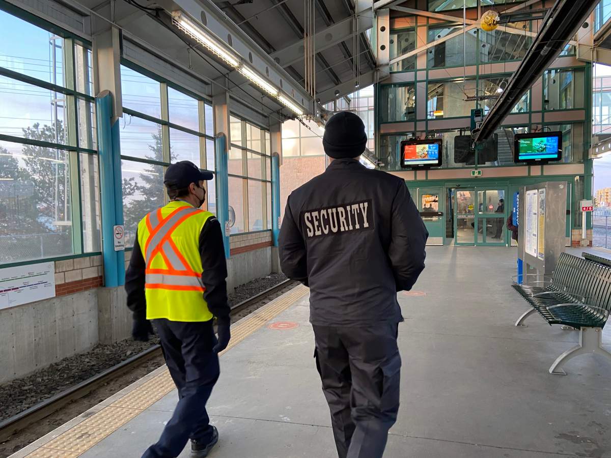 Transit security walks through the LRT station