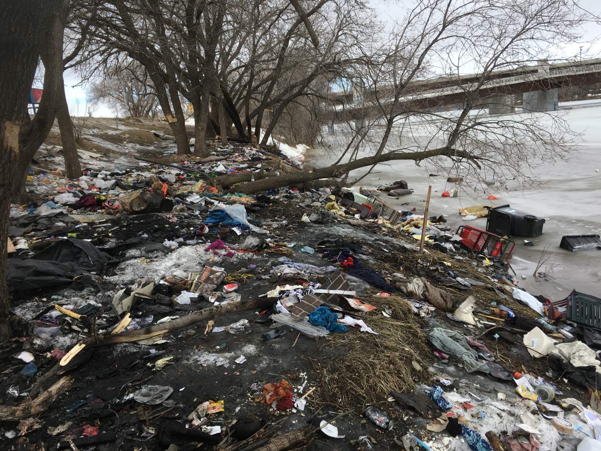 An avalanche of garbage along the bank of the Red River in the Point Douglas area.