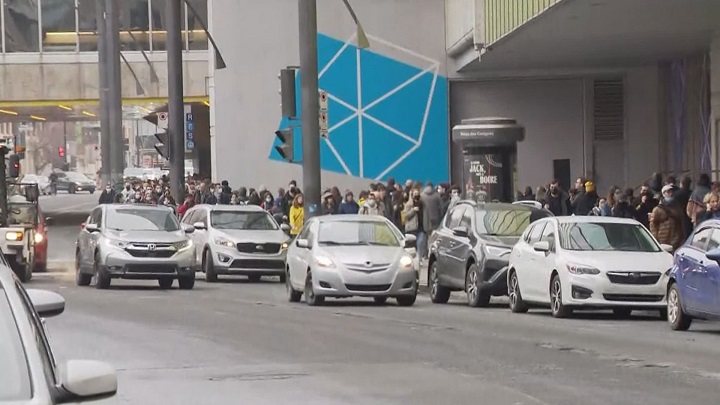 French nationals stand in line at Montreal’s Palais de Congrès to vote in their country’s presidential election. Saturday, April 9, 2022.