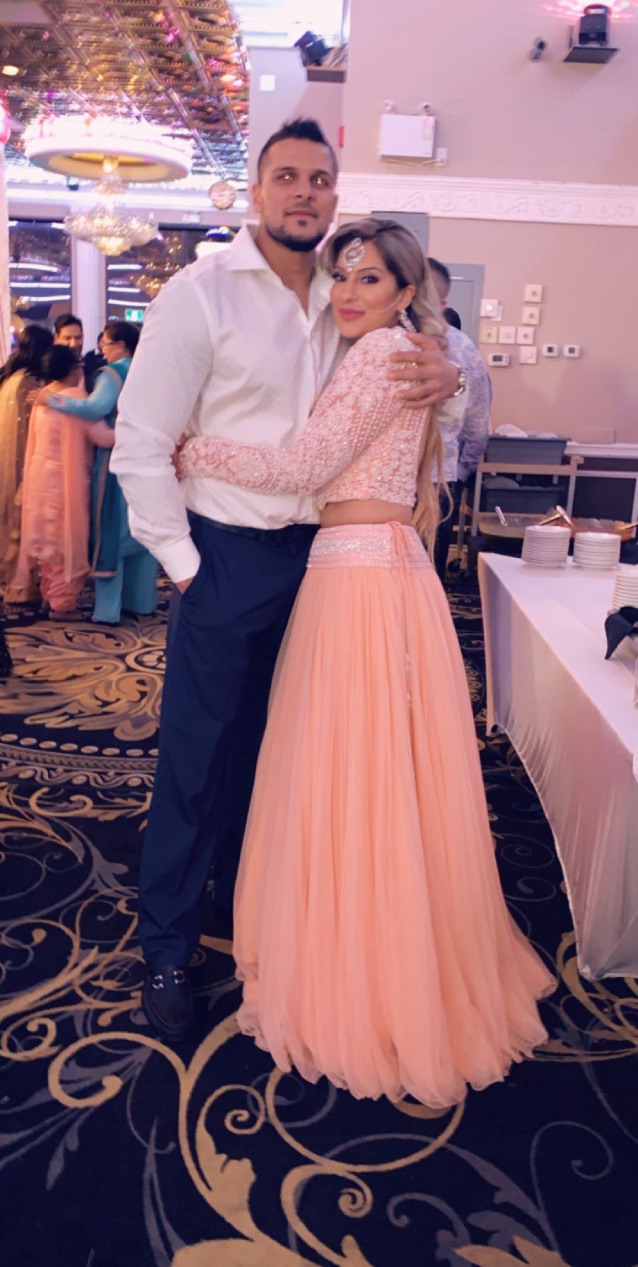 Michael Singh Mann and his sister Rav Mann Johal at a wedding.