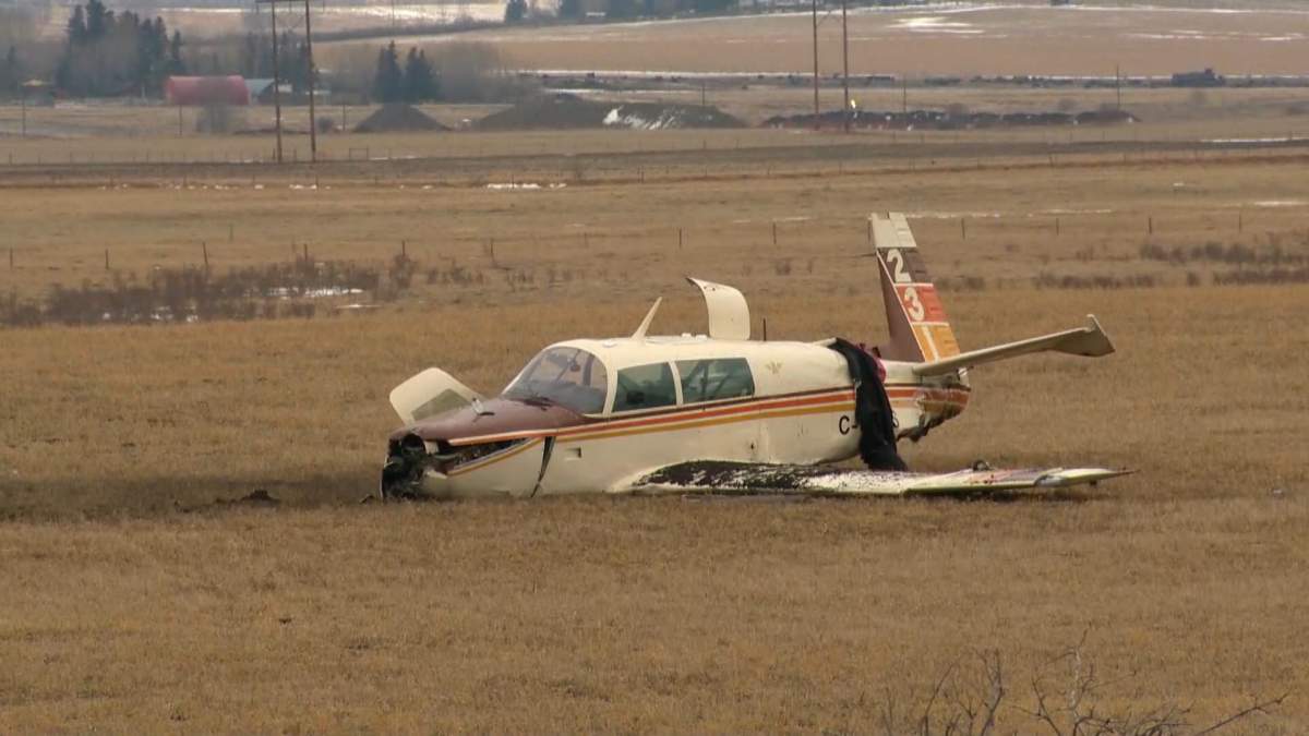 A small aircraft is seen just outside Springbank Airport on April 22, 2022. The TSB said it crashed just north of Highway 1 west of Calgary at around 3:15 p.m.