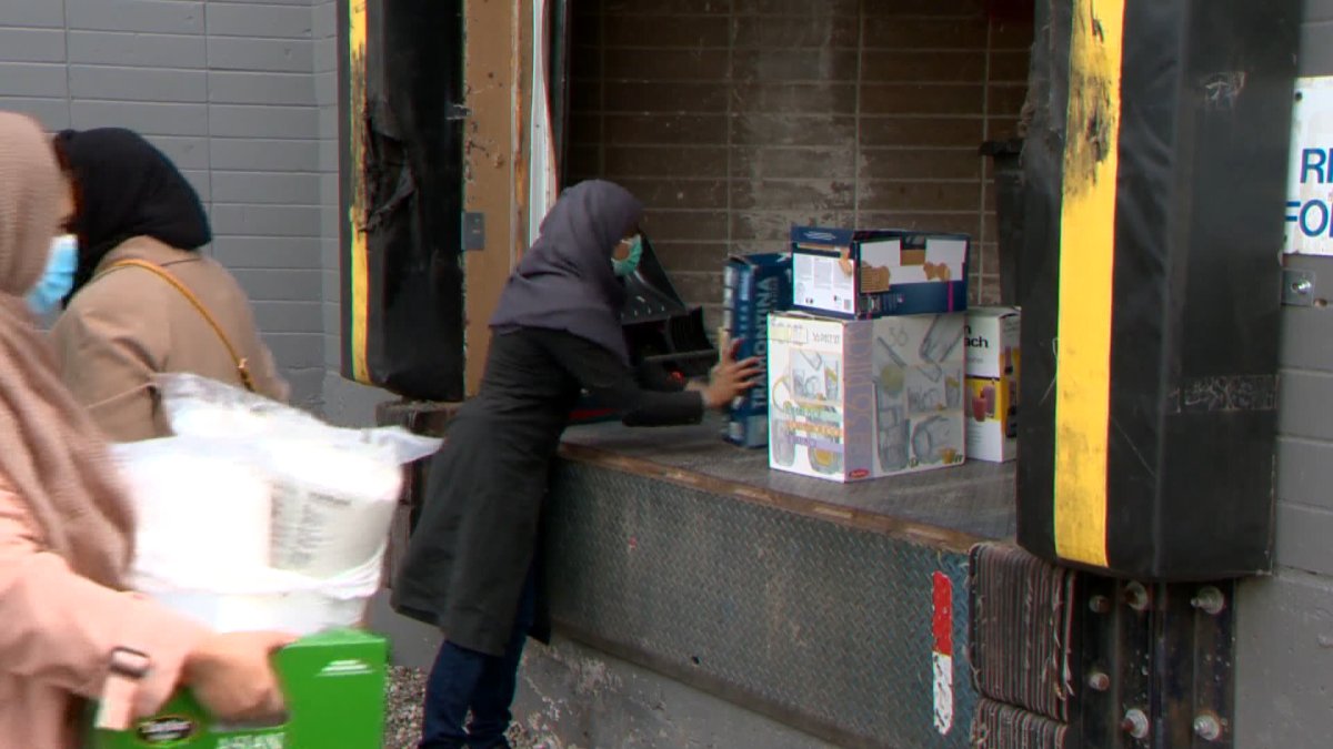 Members of Calgary's Ahmadiyya Muslim Women’s Association drop of household items to be given to Ukrainians fleeing that war-torn country, on April 25, 2022.