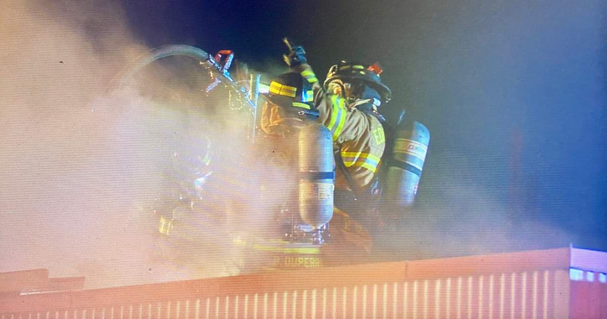 Edmonton firefighters battle a blaze at T.D. Baker School Thursday, April 14, 2022.
