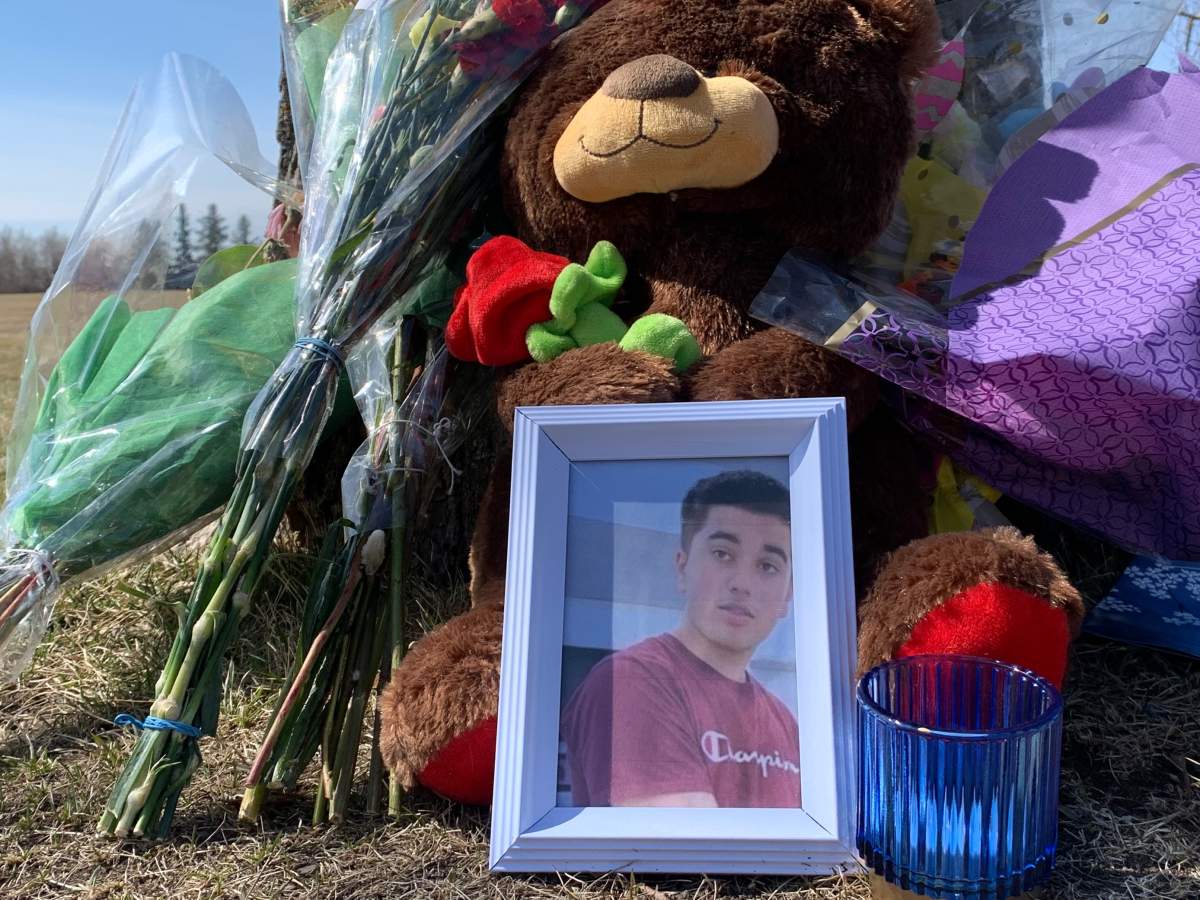 A memorial outside McNally High School in Edmonton for Karanveer Sahota, who died after being assaulted April 8, 2022.