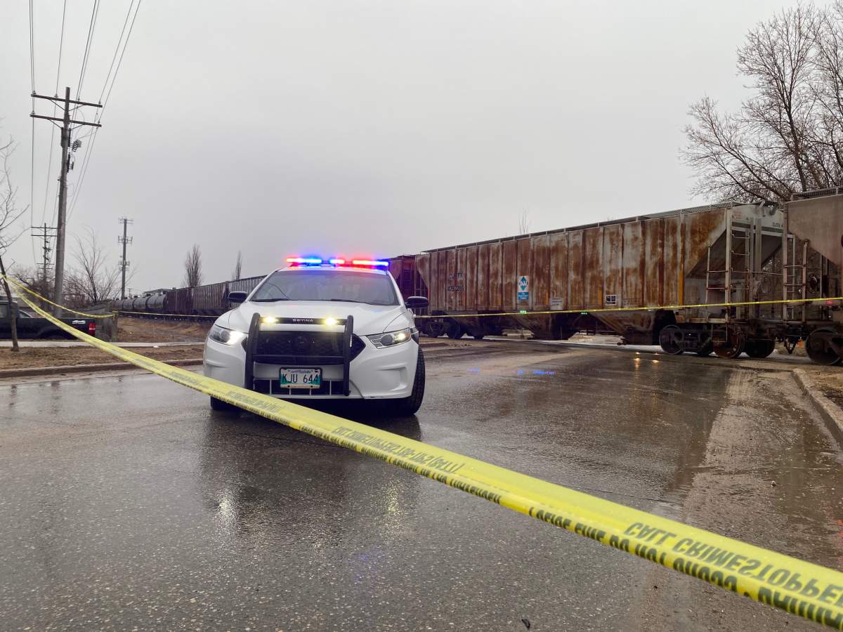 Two people taken to hospital after train-vehicle collision near South Perimeter - image
