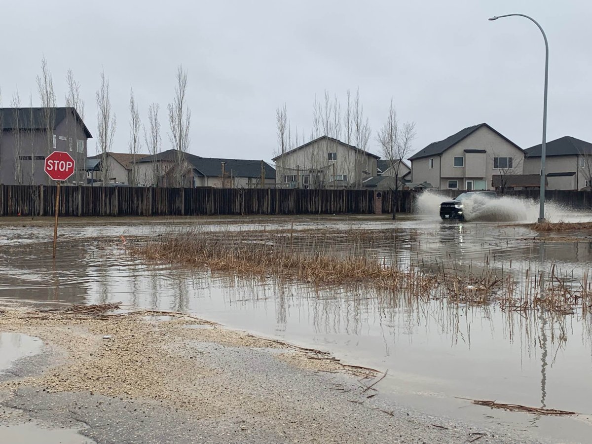 Winnipeg's Transcona area experiences overland flooding on April 23, 2022. As of Sunday afternoon, the Colorado low had dumped about 65 millimetres of rain on the city since Friday.