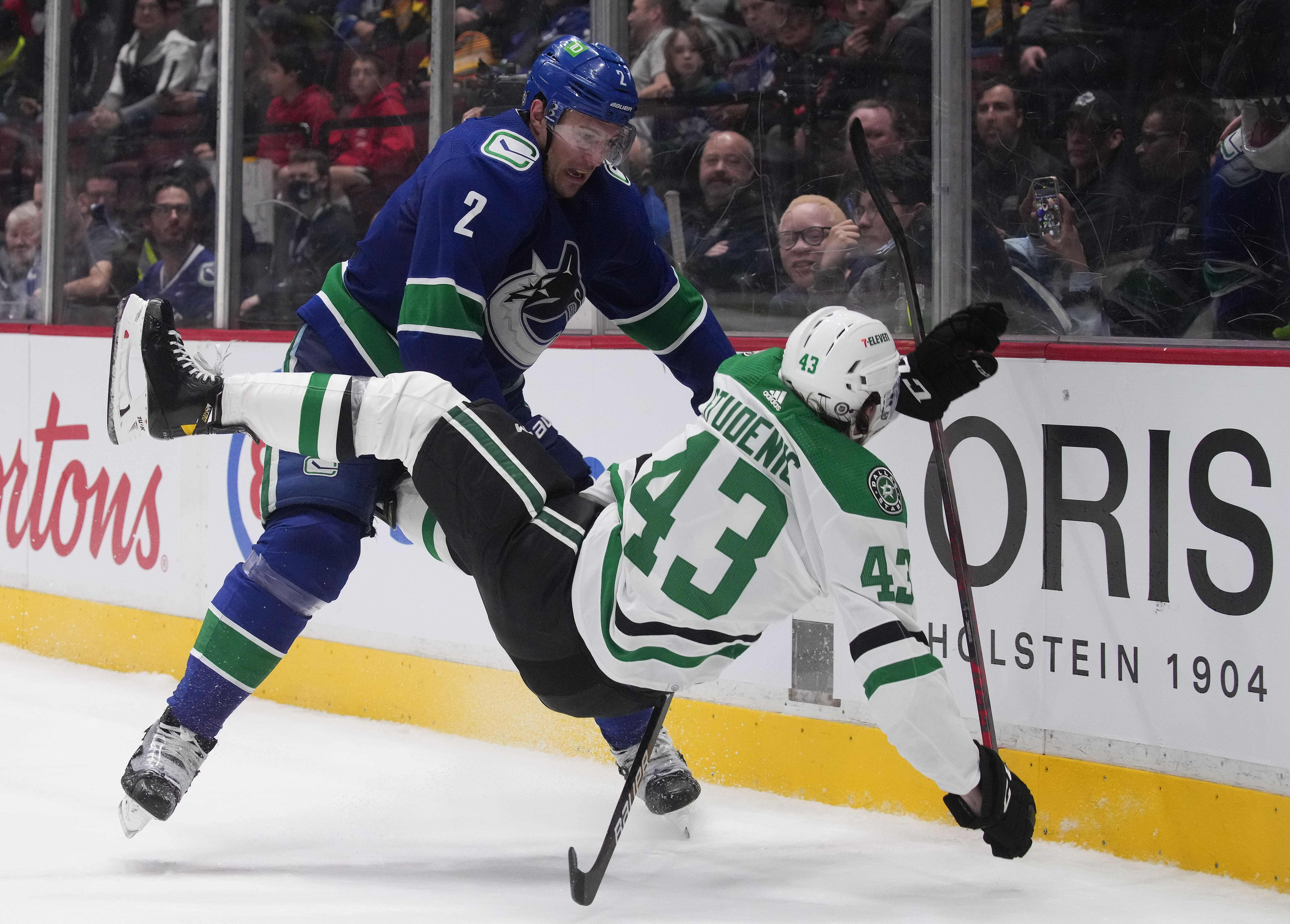 Jersey tossed on the ice is sign of the times for troubled Canucks