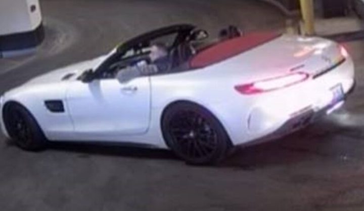 The vehicle is described as a white, 2019, or newer, Mercedes AMG GT convertible with a red interior and convertible top.