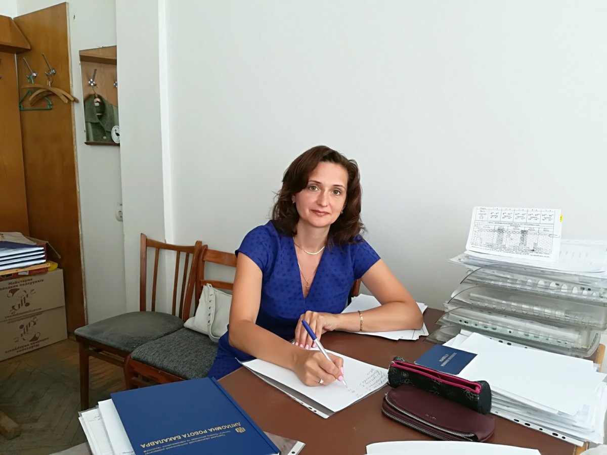Oksana Klepikova working at her desk at Odesa National Polytechnic University in Ukraine.