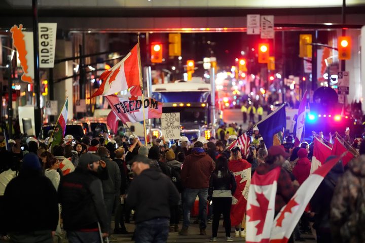 Protesters gather during a demonstration, part of a convoy-style protest participants are calling “Rolling Thunder”, in Ottawa, Friday, April 29, 2022.