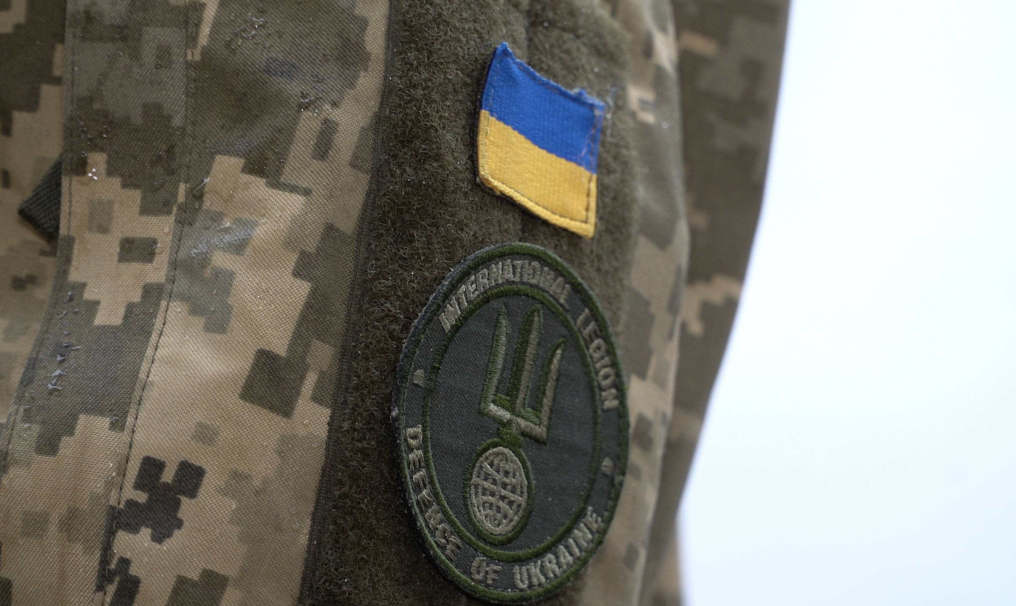 Igor Volzhanin wears the patch of the Ukrainian military’s international legion on his uniform.