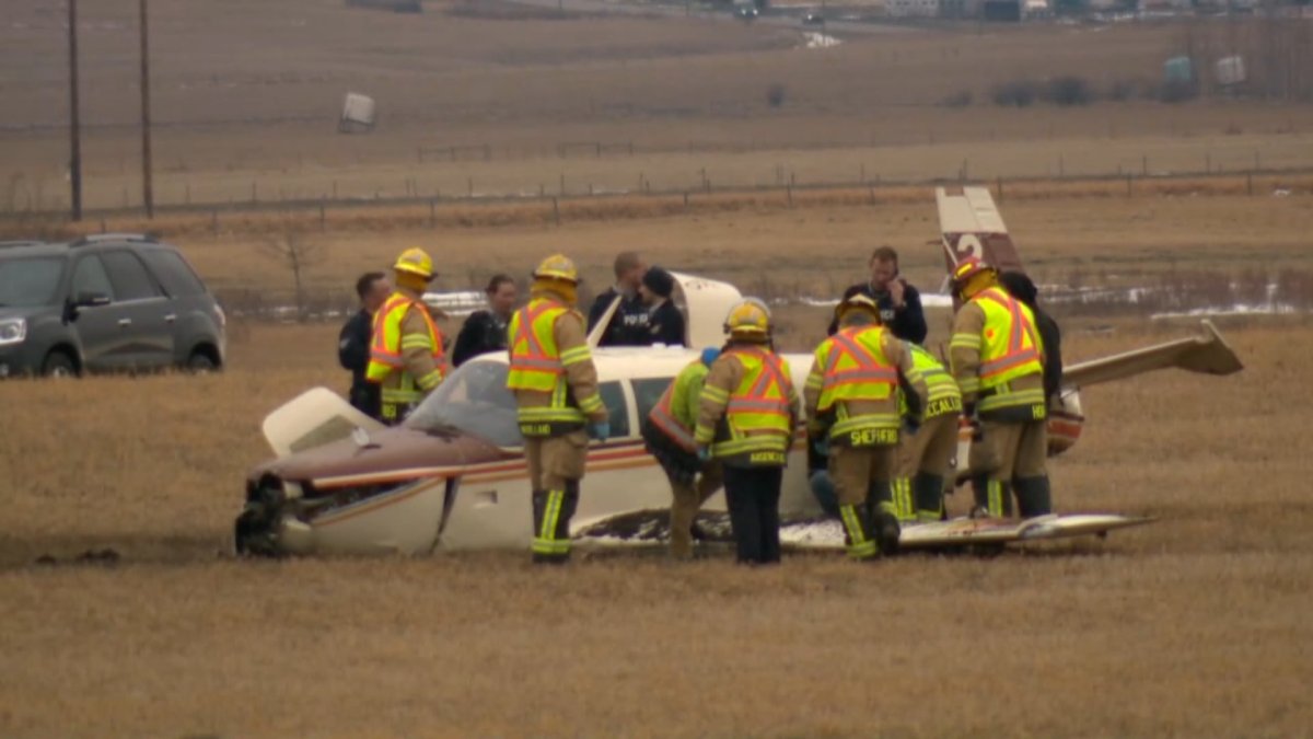 Emergency crews on the scene near Springbank Airport for a plane crash on April 22, 2022.