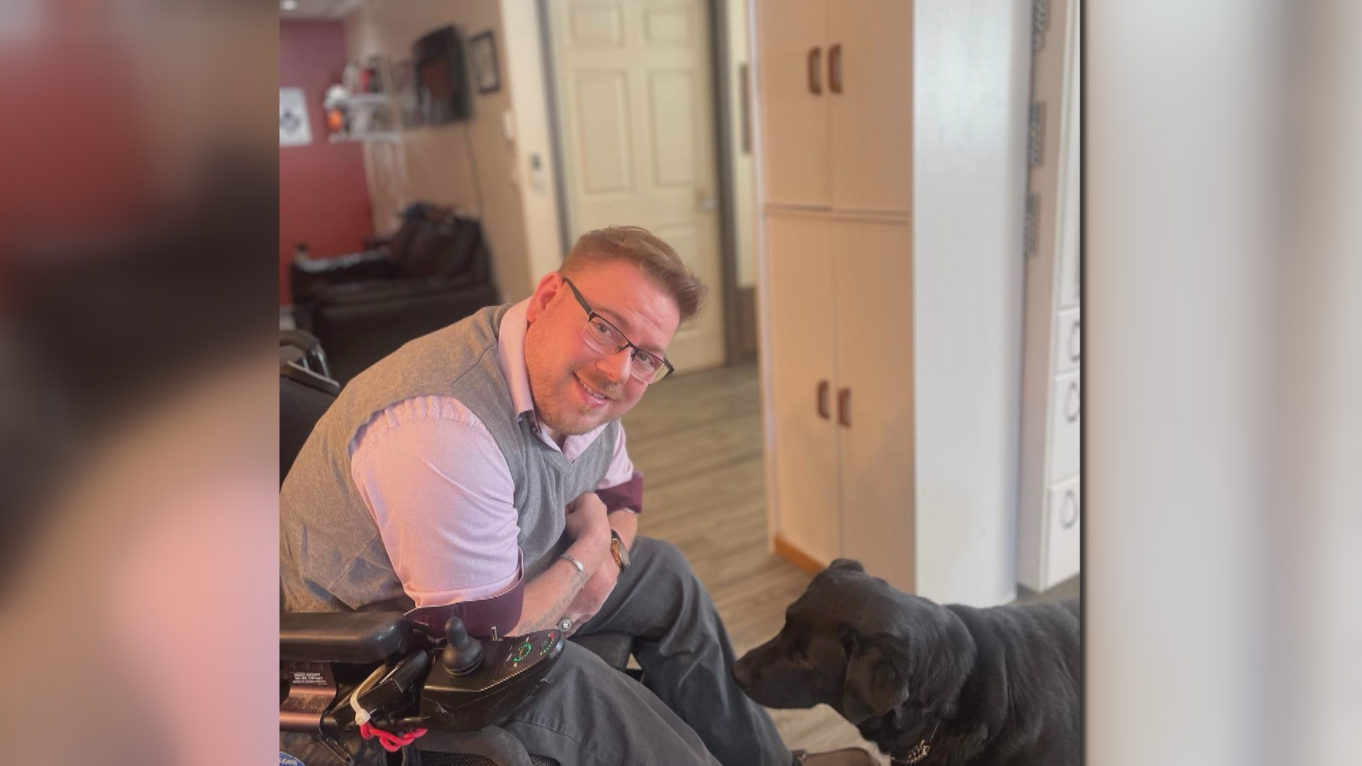 Alex Lytwyn with his dog at home.
