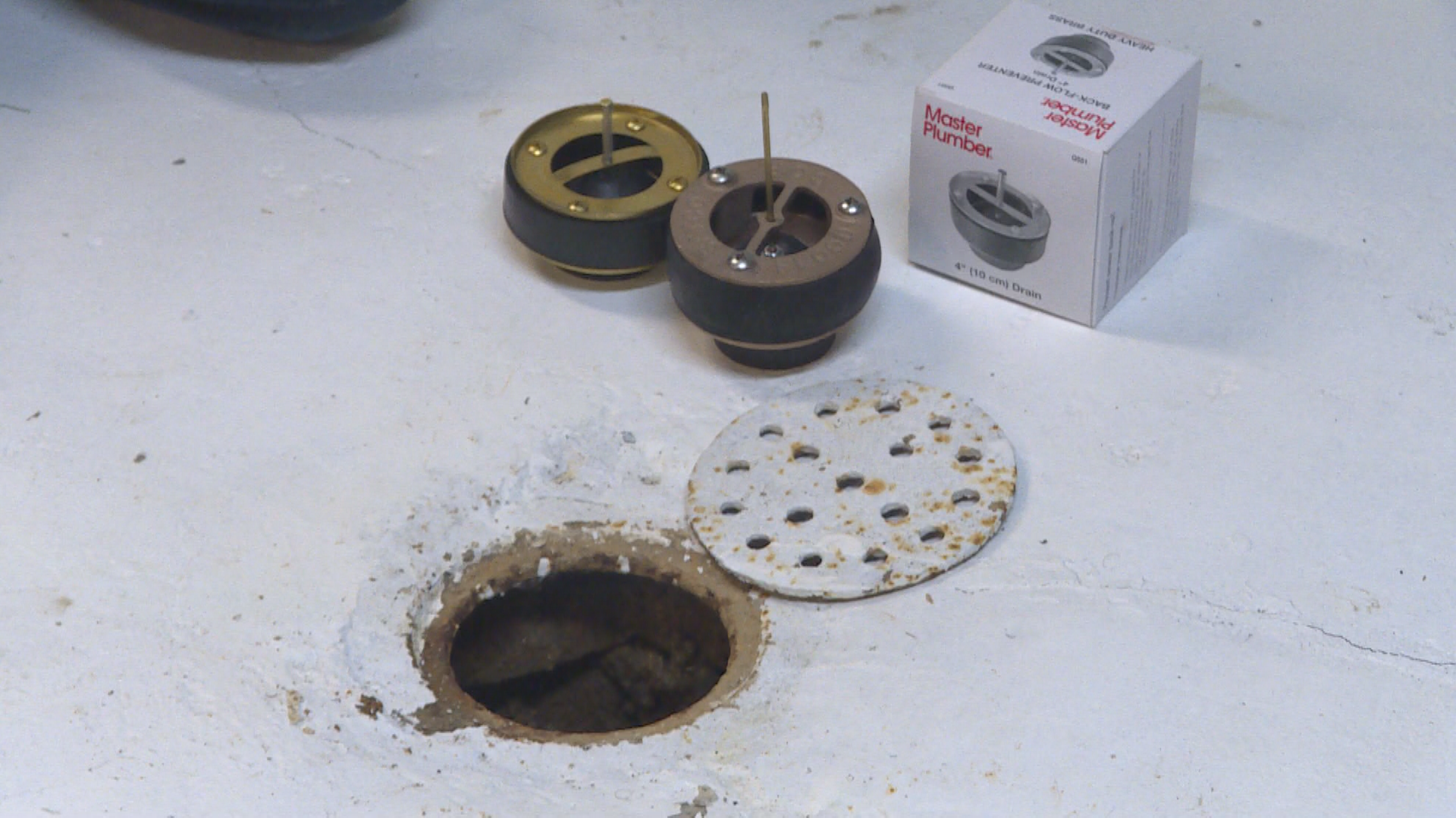 Dallas Friesen of Lynn’s Plumbing and Heating demoing a flood protection system.