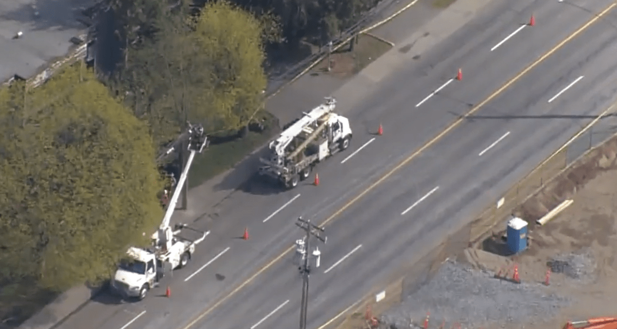 Crews make repairs to an Abbotsford utility pole after it was struck in a single-vehicle crash on Saturday night. 