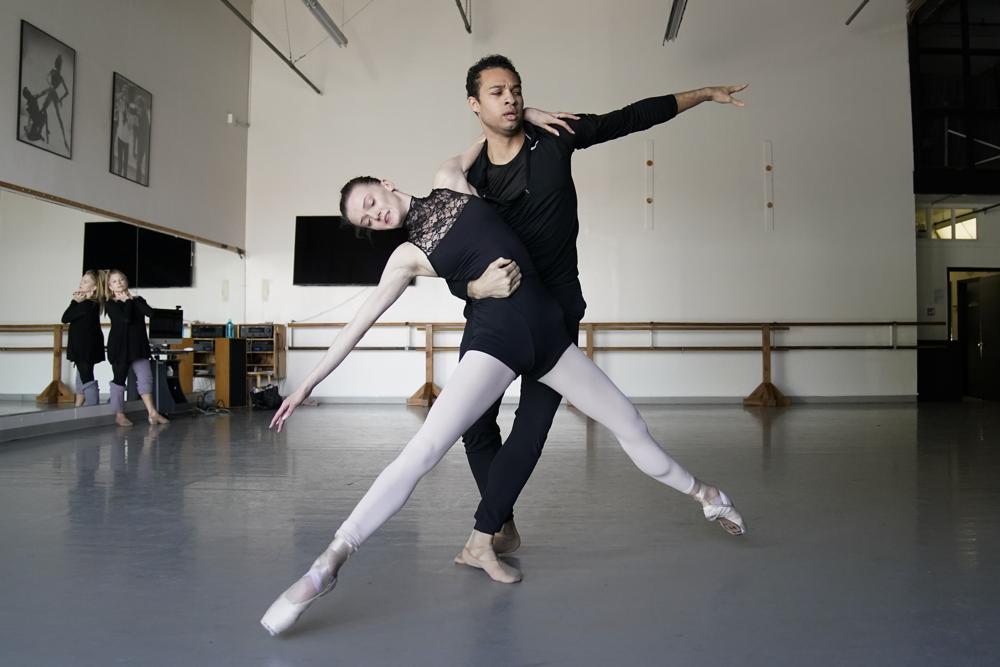 Adrian Blake Mitchell, right, and Andrea Laššáková rehearse with Francine Kessler Lavac, left, on Monday, April 18, 2022, in Santa Monica, Calif. (AP Photo/Ashley Landis).