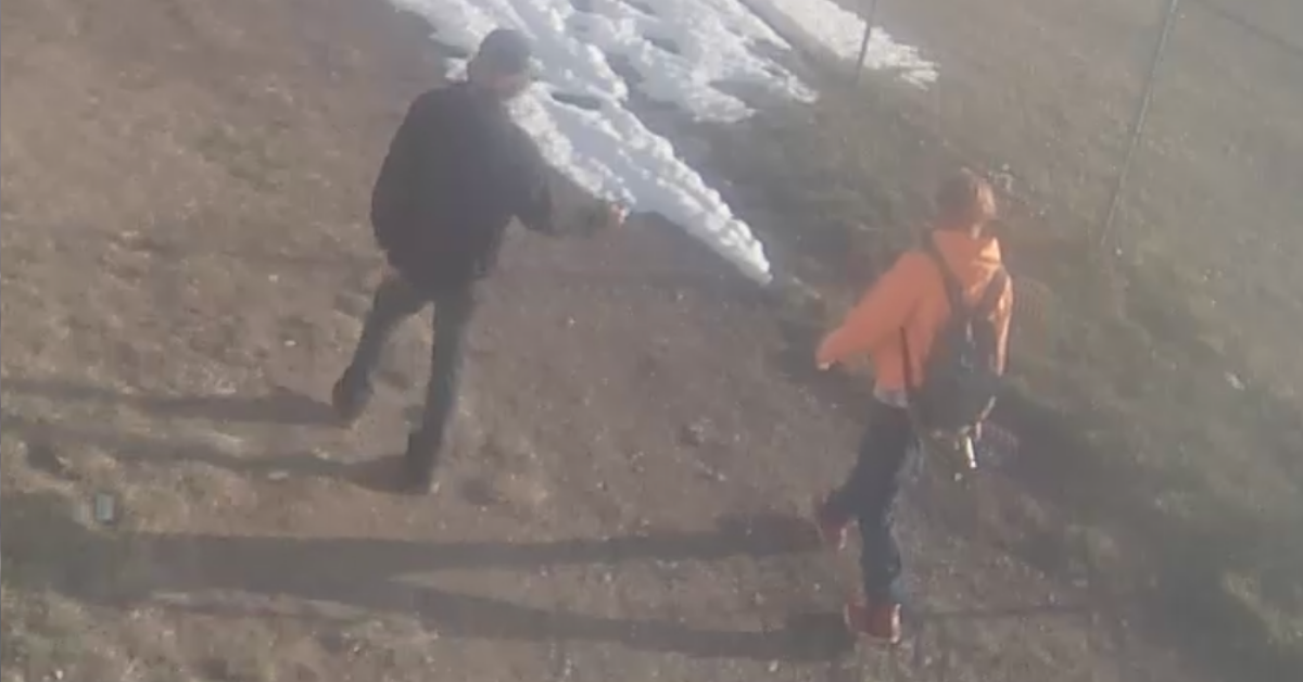 Strathmore RCMP are searching for 2 men, seen here at 6:53 p.m. on April 23, 2022 who are considered suspects for arson damage at Crowther Memorial Junior High School.