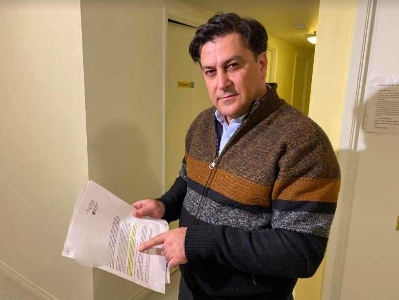 Javad Mokhtarzadeh of Montreal holds his April 2020 letter from Department of Homeland Security’s Traveler Redress Inquiry Program. Mokhtarzadeh was deemed inadmissible to the U.S. on Dec. 18, 2019. Global News has blurred out personal information on the form.