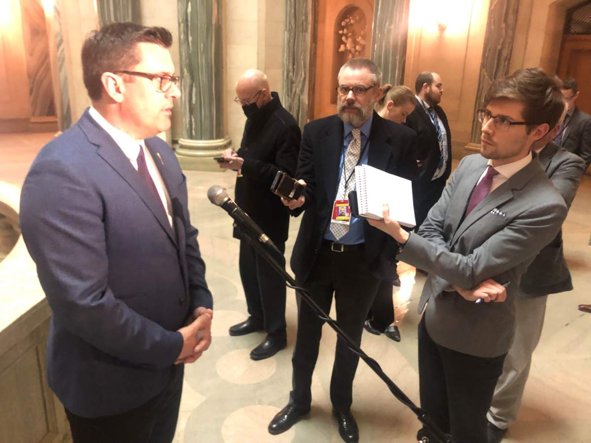 Saskatchewan Health Minister Paul Merriman speaks to reporters about plans to increase surgical capacity on April 26, 2022.
