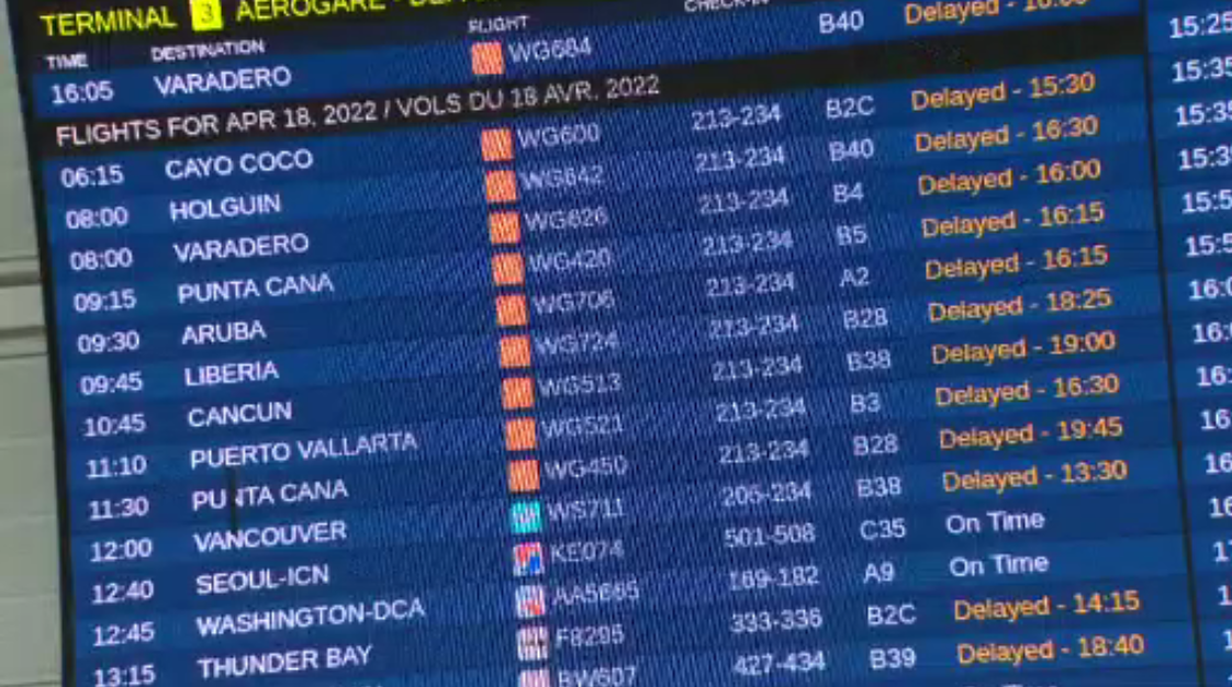 Board showing delays for Sunwing flights at Pearson Airport on Monday.