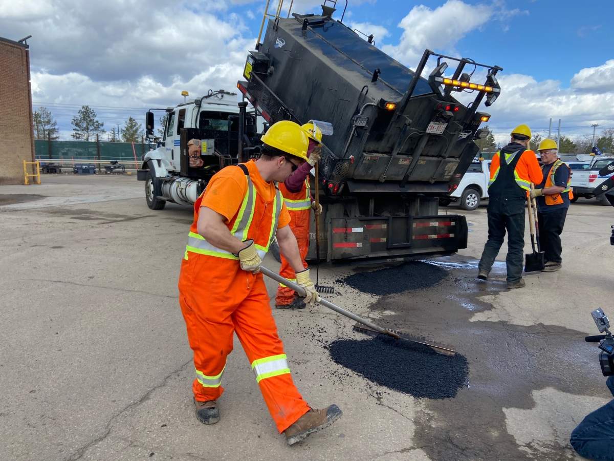 City of Edmonton crews repair potholes Thursday, April 28, 2022.