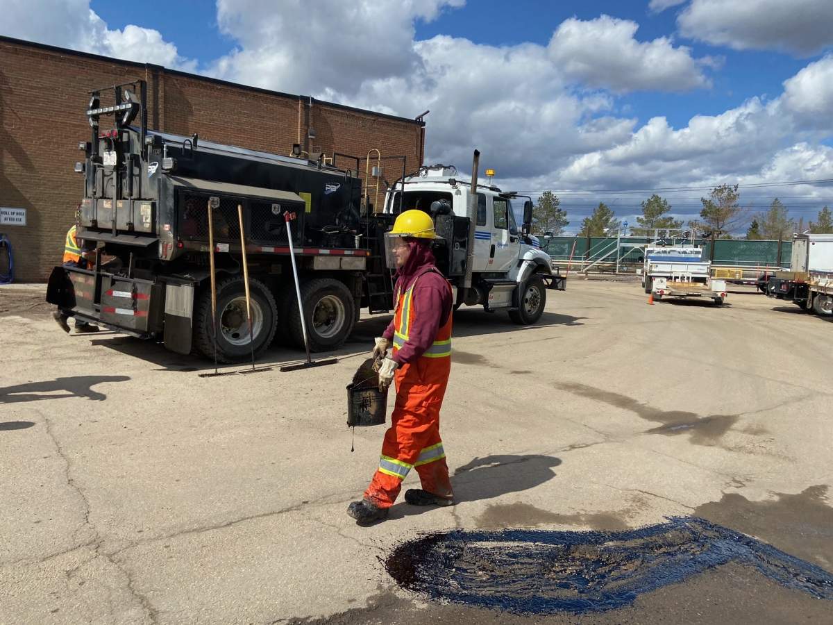 City of Edmonton crews repair potholes Thursday, April 28, 2022.
