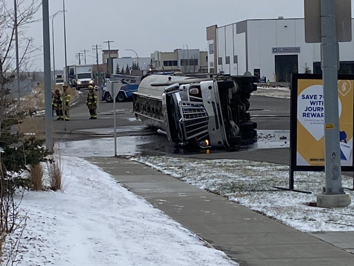 An overturned truck is seen at 52 Street at 110 Avenue S.E. in Calgary's East Shepherd Industrial on April 12, 2022.