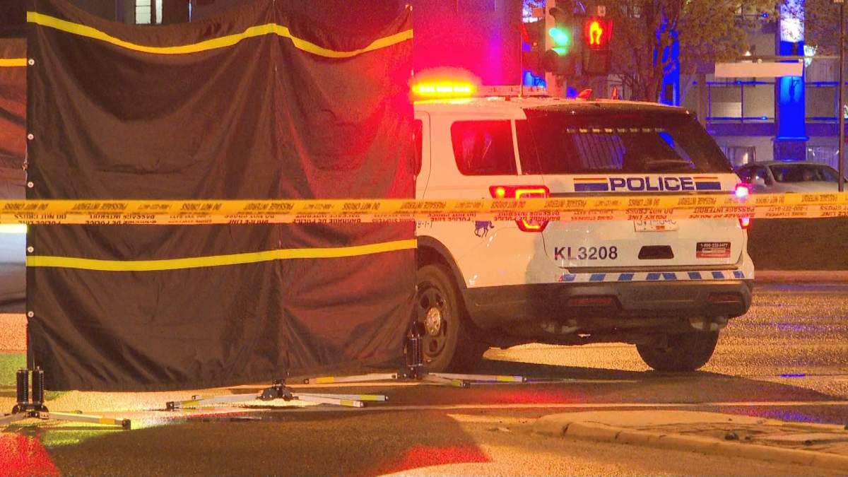 Kelowna’s Harvey and Gordon intersection surrounded by yellow tape - image