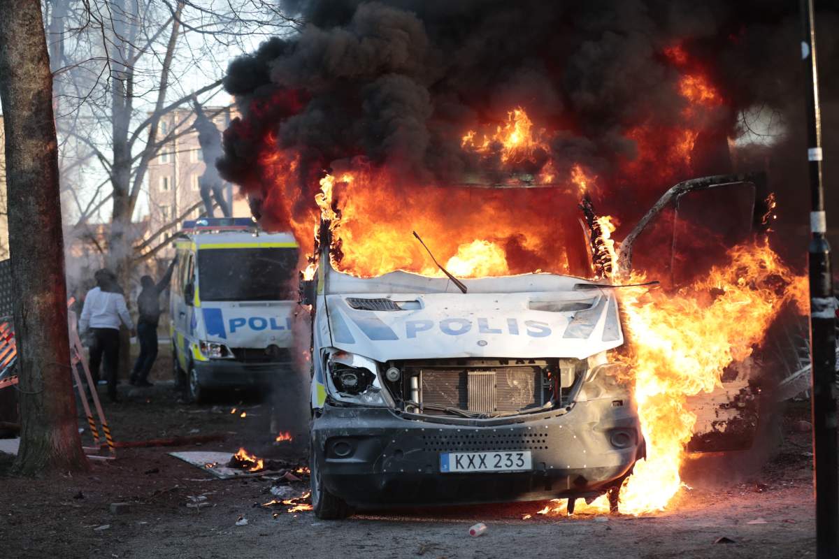 police riot sweden car fire