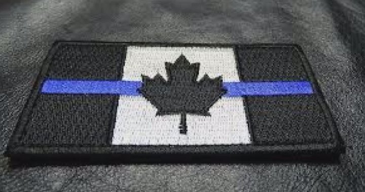 Calgary police officers defy order to remove thin blue line patches from uniforms